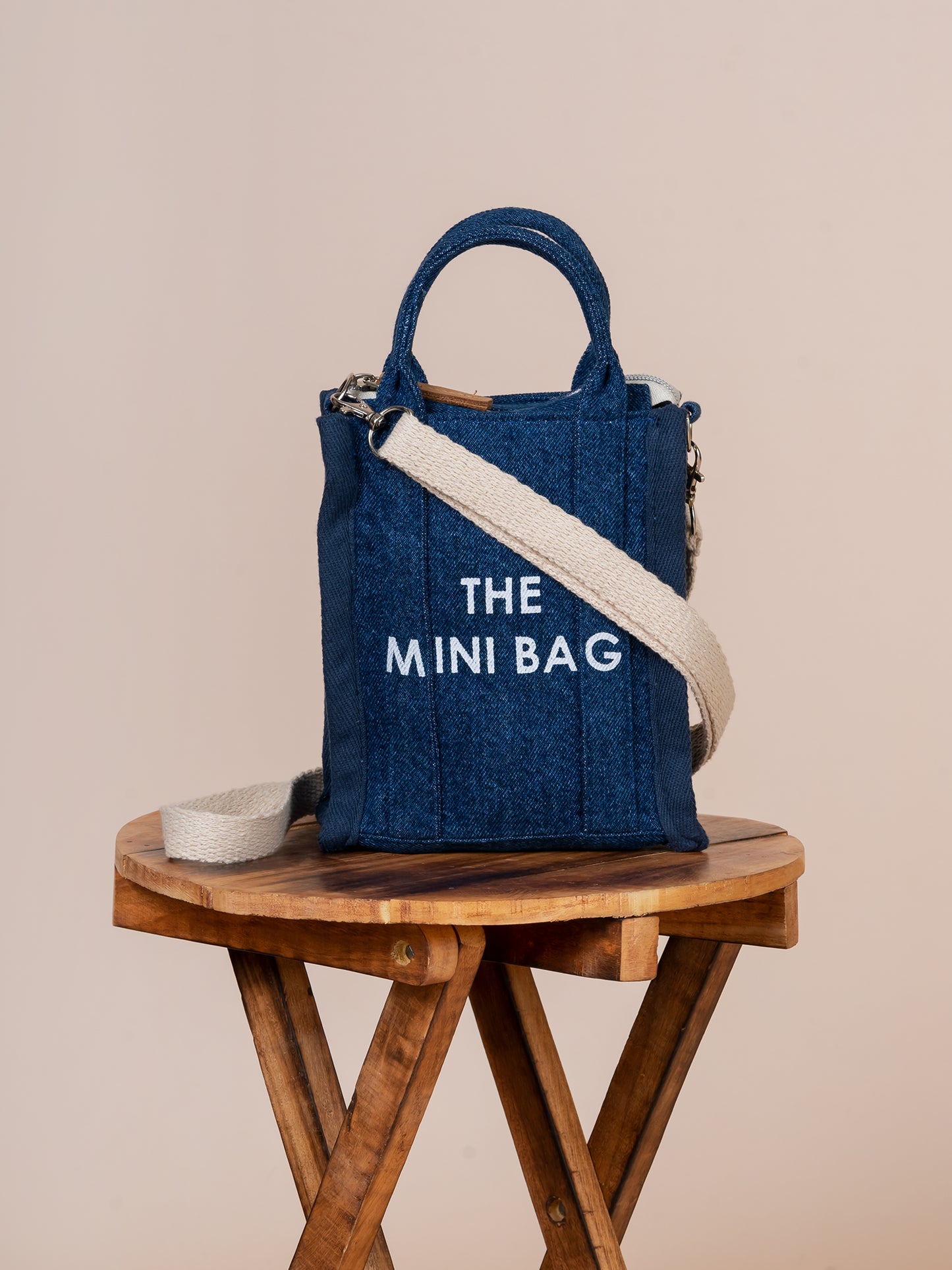 The Mini Crossbody Denim Bag